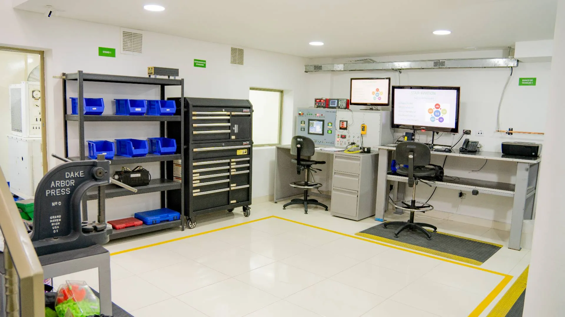A neat room with a desk and a computer monitor, emphasizing a minimalist and orderly environment.