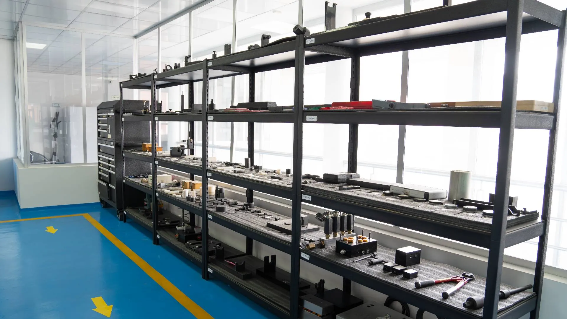 An organized room showcasing multiple shelves stocked with an array of tools and supplies